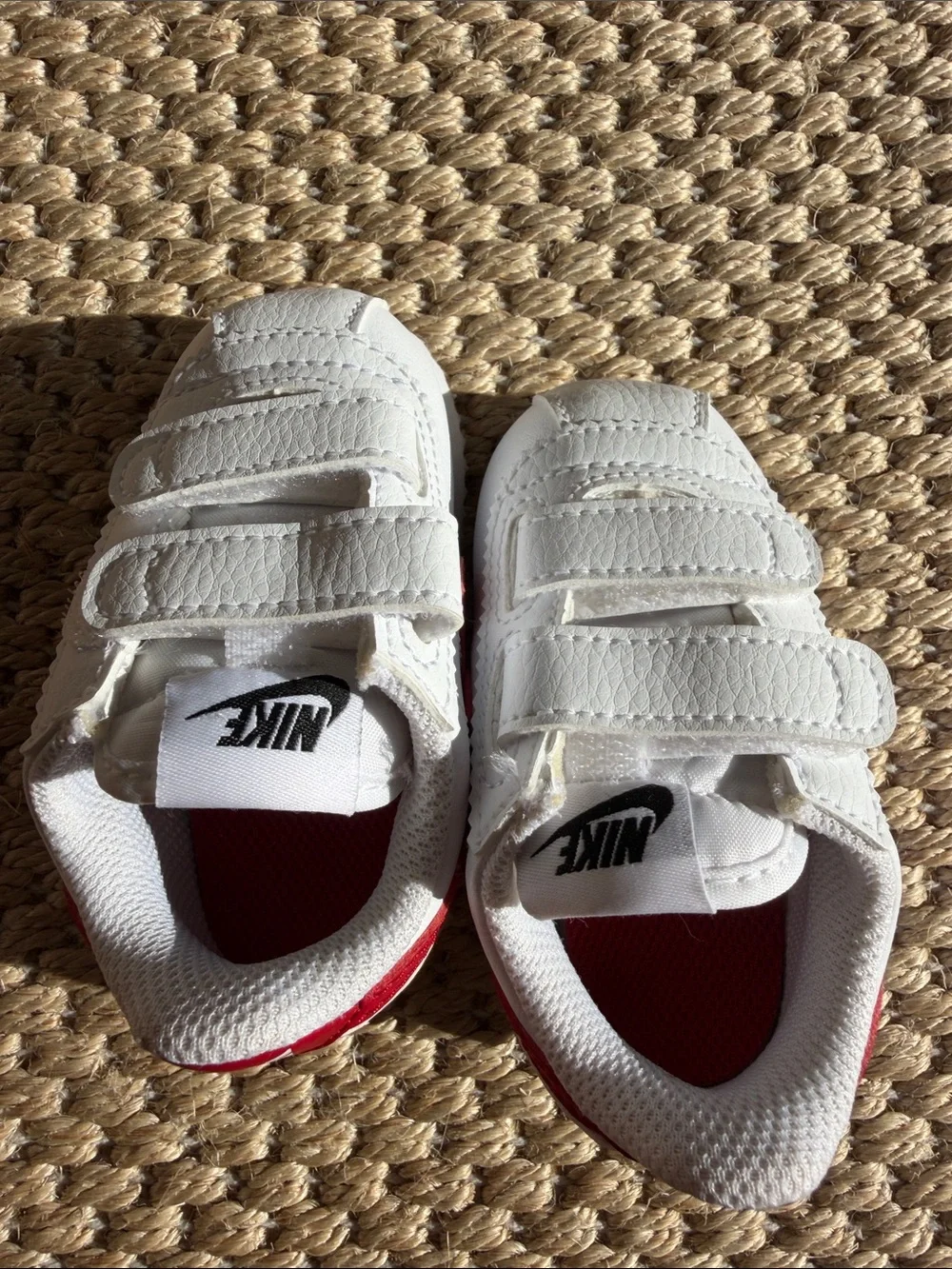 Nike White Baby Sneakers with Red Swoosh and Blue Accent size 4c